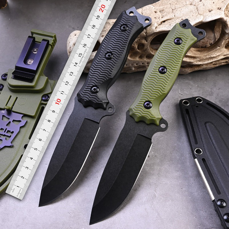Two A3 High Hardness Outdoor Multifunctional Portable Knives from eprolo, one black and one green with textured handles, are shown on a surface alongside their sheaths and a ruler, highlighting their measurement and utility for survival practicality in outdoor adventures.