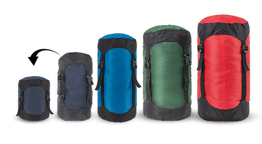 Five colorful eprolo 40D nylon compression sacks for sleeping bags are displayed. Featuring Lightweight and portable / waterproof and anti-tear / cap design / strong compression labels, one sack is compressed against a light background to demonstrate their packing efficiency.