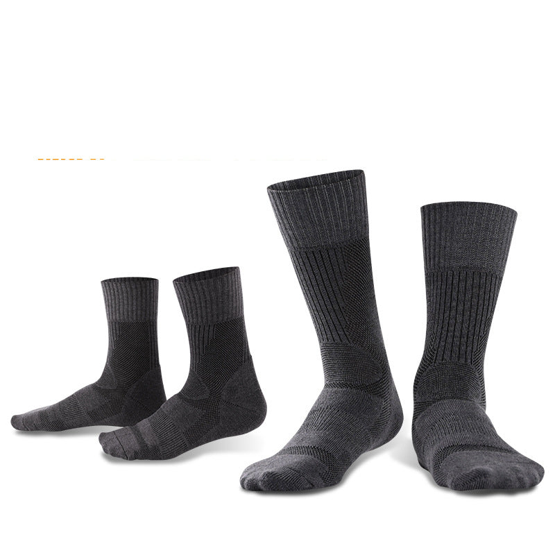 Two pairs of eprolo Outdoor Merino Wool Hiking Socks in dark gray, one smaller and one larger, stand upright on a plain white background. These breathable socks feature ribbed cuffs and reinforced heels and toes.