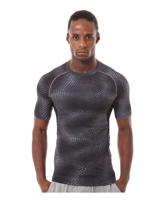 A person in an eprolo Mens Quick-Dry Serpentine Athletic Fit Compression T-Shirt in black and gray with gray shorts stands against a plain white background.