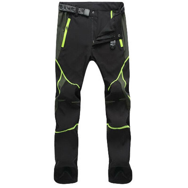 The Mens Quick-Dry Color-Stitched Hiking Pants by eprolo feature a windproof design, combining black and gray with neon green accents and zippers for breezy comfort outdoors.