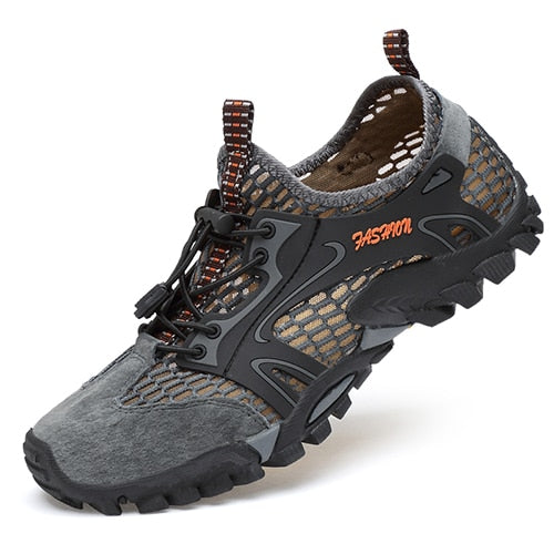 The eprolo Mens Summer Breathable Hiking Shoes blend a rugged non-slip outsole with gray and black hues, featuring FASHION in orange, elastic bungee laces, and quick-dry suede and mesh materials for ideal outdoor footwear.