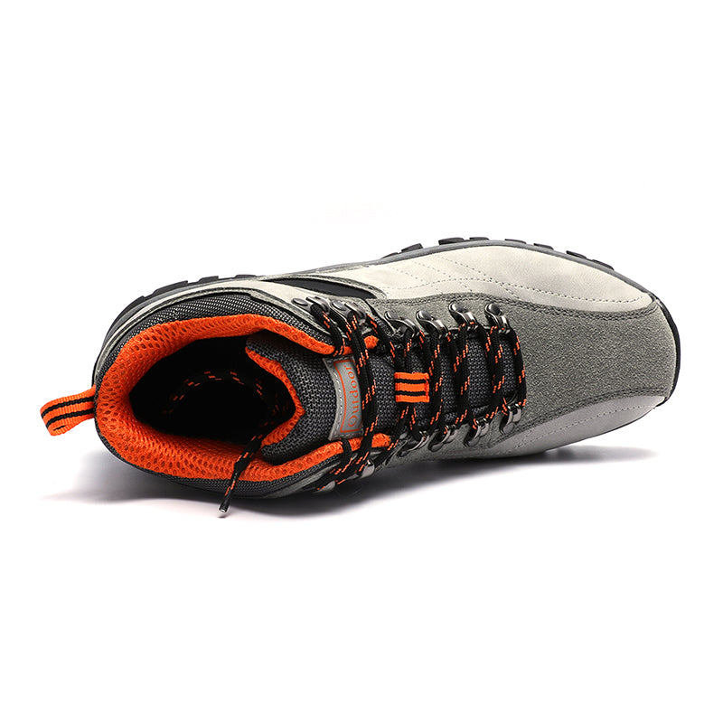 The My Store Breathable Waterproof Hiking Sneakers in gray and black feature rugged black and orange laces, a heel loop, a textured anti-slip rubber sole, and an orange breathable waterproof interior lining for a sporty design.