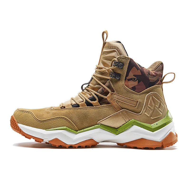 These RAX Womens Waterproof Hiking Boots by Ten Essentials combine style and function with a tan suede upper, black accents, and camo around the ankle. They feature an antislip rubber outsole, green and white midsole details, an orange outsole, and multiple lace eyelets for lightweight comfort.