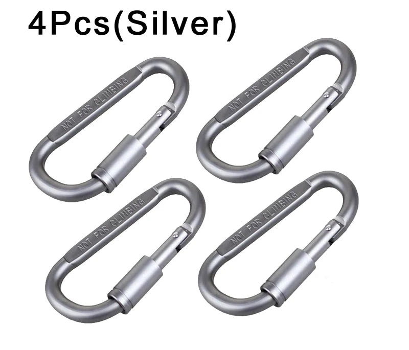 The Ten Essentials 4-Piece Aluminum Carabiner Travel Kit clearly displays NOT FOR CLIMBING on each silver carabiner, making them ideal for travel, camping, and hiking.