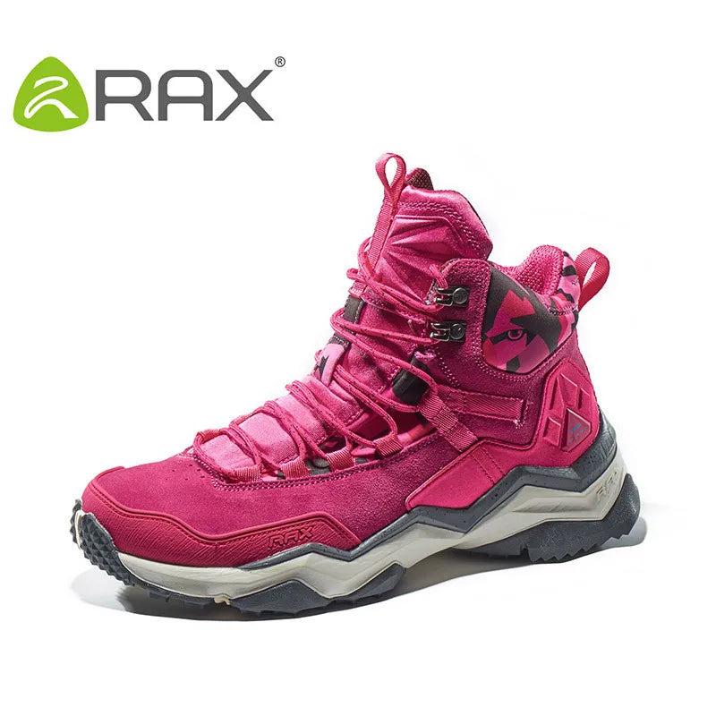 The Ten Essentials RAX Womens Waterproof Hiking Boots in vibrant pink feature a high-top design with an antislip rubber outsole for superior traction, black accents, metallic lacing hooks, and a side logo for lightweight comfort. Displayed on a white background with the RAX logo in the top left corner.