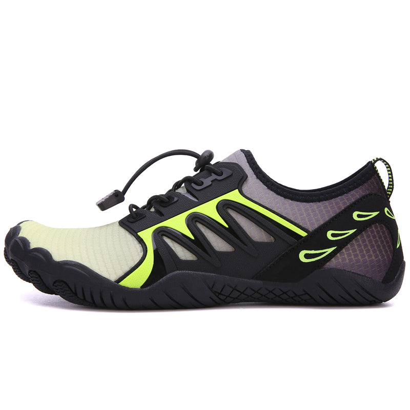 The Modalyst Barefoot Quick Dry Beach Pool Aqua Shoes for men are lightweight, minimalist athletic shoes with black soles and green accents. They are perfect for water activities, featuring a breathable mesh upper, lace-up closure, and unique wave side design for a sleek, sporty look.