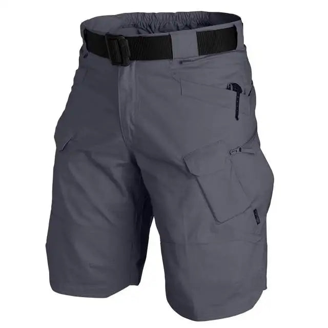 Ten Essentials Men’s Tactical Cargo Shorts are waterproof and ideal for hiking and camping, featuring a multi-pocket design with a black belt and zippered side pocket. The lightweight, breathable fabric with a slightly elastic waistband ensures comfort during outdoor activities.