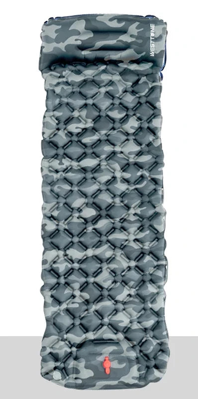 The Ten Essentials Ultralight Inflatable Camping Sleeping Pad features a built-in pump and travel pillow, crafted from durable waterproof materials. Unfolded, it measures 190cm by 58cm and packs down to 27cm by 10cm. Weighing just 590g, this pad boasts a vibrant blue and grey camo pattern.
