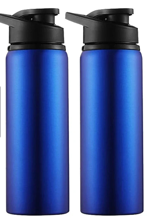 Two Ten Essentials blue stainless steel water bottles with black lids are side by side. The left one has a BLUE 2PCS label in white on light blue. Perfect for outdoor sports, these portable, reusable 700ml flasks offer durability and style on the go.