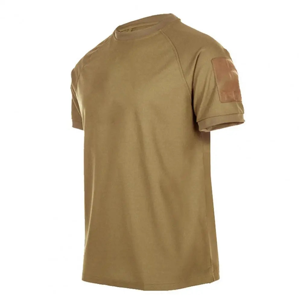 The Ten Essentials Mens Quick-Dry Military T-Shirt, shown in plain brown with a round neckline and a small patch on the left sleeve against a white background, features lightweight, breathable, moisture-wicking fabric for optimal comfort and quick-dry performance.