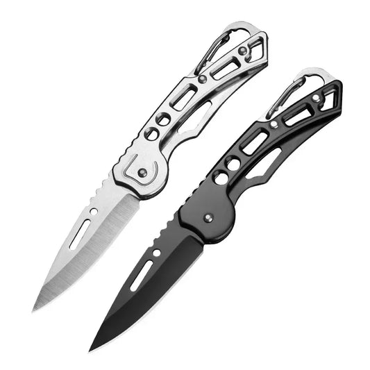 The Ten Essentials Folding Stainless Steel Pocket Knives—one silver and one black—come with partially serrated carbon steel blades, lightweight skeletonized handles, and integrated carabiner clips, making them an ideal portable survival and outdoor tool.
