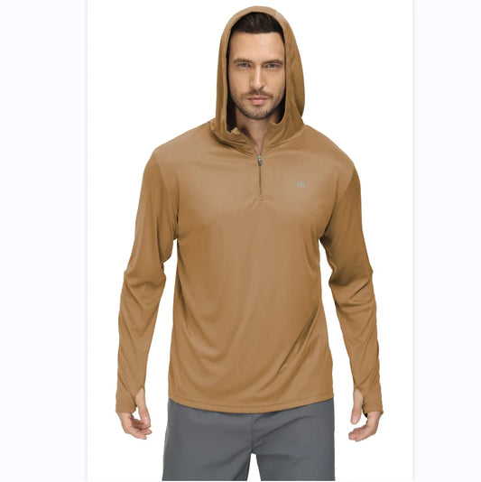 A man models the Ten Essentials UPF 50+ Long Sleeve Hoodie – Quick-Dry Rash Guard for fishing, hiking & outdoor sports. Wearing the tan hooded shirt with a quarter-zip and thumb holes, he stands against a white backdrop paired with gray pants.