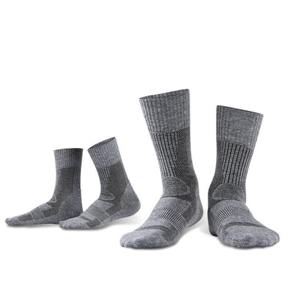 Four gray eprolo Outdoor Merino Wool Hiking Socks, two large and two small, are shown upright. These breathable socks have a cushioned midsole, ribbed ankle texture, and varied knit foot pattern for comfort and warmth.