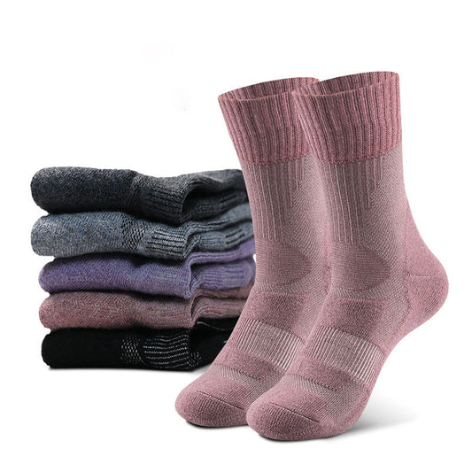 In the foreground, pink textured eprolo socks with a breathable design are perfect for adventures. Behind them is a stack of eprolo’s Outdoor Merino Wool Hiking Socks in gray, blue, purple, and black, featuring ribbed cuffs and cushioned midsole for a soft and thick feel.