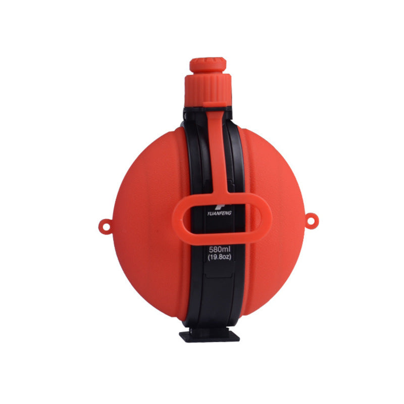 The Portable Silicone Folding Sports Water Bottle by eprolo is red and circular with a black central stripe and screw-on cap. Its collapsible design allows easy storage, made from food-grade silicone. It displays 580ml (19.6oz) in white text, with loops for convenient carrying.