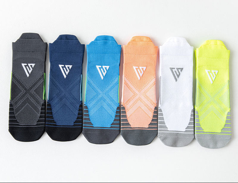Modalysts 6 Pairs For Women Compression Sports Socks include moisture-wicking, anti-blister, cushioned features in dark gray, navy blue, light blue, orange, white, and neon yellow. Ideal for running and hiking with a geometric design and small logo.