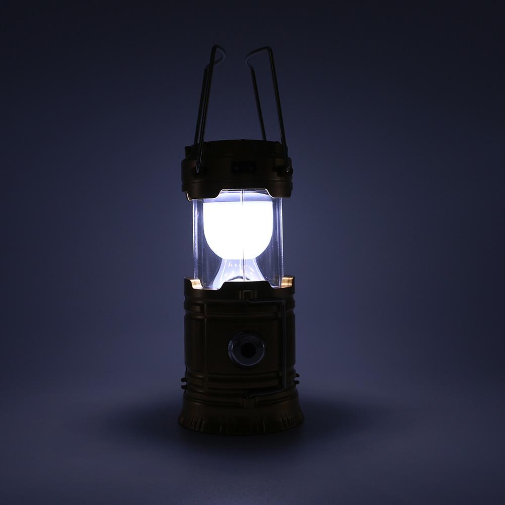 The eprolo LED Hand Lamp Rechargeable Collapsible Solar Camping Lantern emits a bright white light, ideal for dark settings. With two wire handles and a circular adjustment knob, its perfect for any emergency preparedness kit.