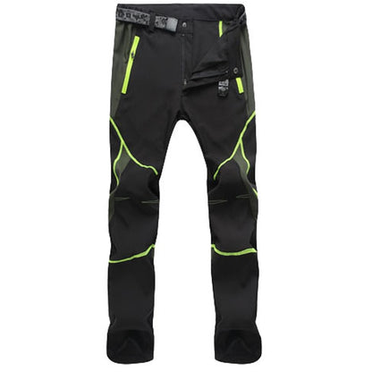 Eprolos Mens Quick-Dry Color-Stitched Hiking Pants are black with green accents and come with a waist belt. They feature green zippers, seams, reinforced knees, and an adjustable waistband. This windproof design is ideal for outdoor or athletic activities.