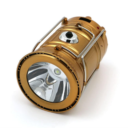 The eprolo gold-colored LED Hand Lamp Rechargeable Collapsible Solar Camping Lantern is ideal for emergency kits. It features a metallic handle, circular reflector, solar panel on the side, and a button on top, combining practicality with style.