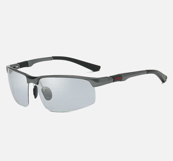 The eprolo Photochromic Sunglasses Polarized Chameleon - Mens feature stylish, rectangular, rimless design with gray-tinted polarized lenses. Black arms, metallic frames with rubberized ear tips ensure comfort, making them ideal for various outdoor activities.