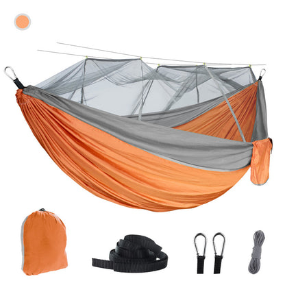 The eprolo Portable Camping Hammock in orange and gray, suspended with a mosquito net, is made from durable 210T parachute nylon. It includes two straps, carabiners, rope, and an orange drawstring storage bag—ideal for outdoor adventures.