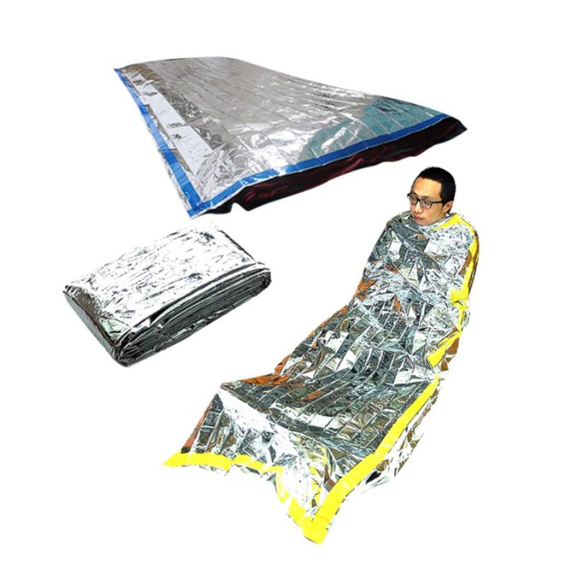 A person is wrapped in a shiny, reflective Custom Outdoor Thermal Bivvy Survival Waterproof Emergency Sleeping Bag by Modalyst, featuring a yellow border. The image displays the bivvy both folded and fully laid out, efficiently retaining body heat with its metallic material.