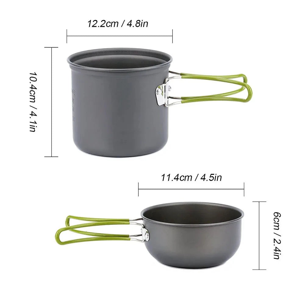 The Ten Essentials Camping Cookware Kit with Stove includes a pot and pan: the pot is 12.2 cm wide by 10.4 cm high, and the pan is 11.4 cm wide by 6 cm tall. Both have green folding handles, perfect for outdoor cooking on hikes or travels. Measurements are given in centimeters and inches.