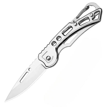 The Ten Essentials Folding Stainless Steel Pocket Knife is a portable survival tool featuring a cut-out design stainless steel handle with a carabiner clip and a sharp carbon steel blade.