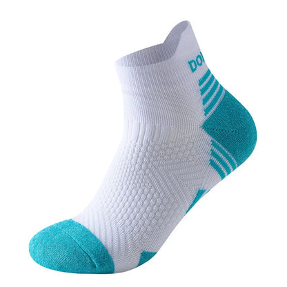 The Ten Essentials Professional Marathon Running Socks are white ankle socks with turquoise toe, heel, and a stripe. They feature breathable mesh, textured comfort, moisture-wicking technology, and ribbed ankles for a secure fit.