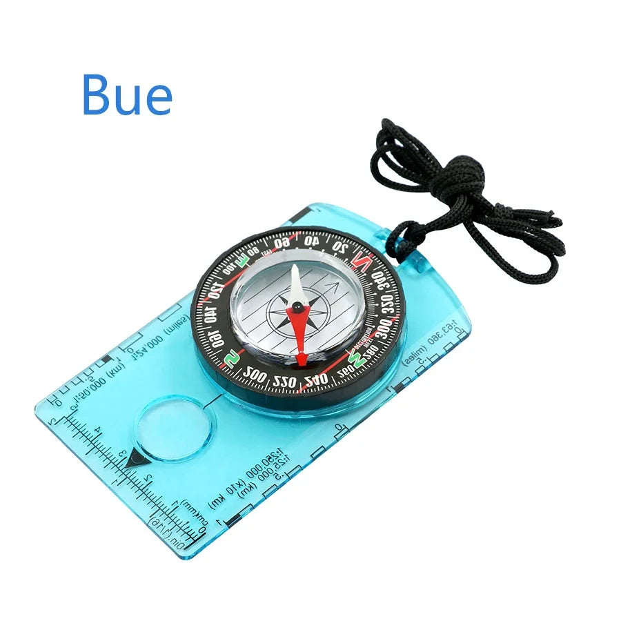 The Ten Essentials Waterproof Hiking & Camping Compass is a blue navigation tool with a rotating bezel, a black and red needle, and rests on a transparent baseplate. It features metric and imperial rulers, includes a black cord, and ensures high-precision navigation for outdoor adventures. Bue is written above.
