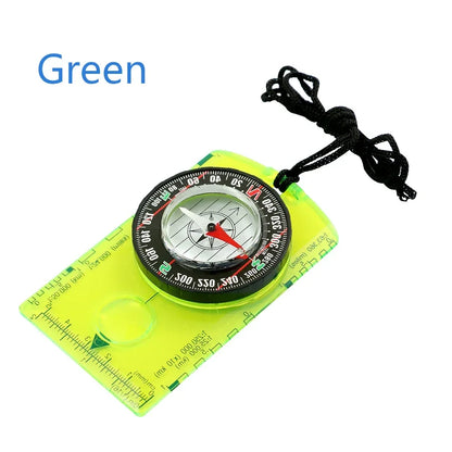 The Ten Essentials Waterproof Hiking & Camping Compass is a professional survival tool. It features a rectangular green design with a black rim, red needle, and black cord. The base has measurement markings and a magnifying lens on a white background, with Green in the top left corner.