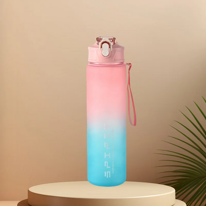 A Ten Essentials sports water bottle, featuring a pink-to-blue gradient and a flip-top lid with a wrist strap, stands on a beige pedestal. It offers motivation with each sip. The soft background has a green leaf peeking in from the side. Capacity: 750-800ML; time-tracking and leak-proof features included.