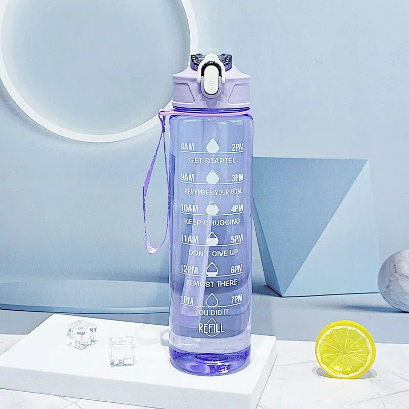 A translucent purple Ten Essentials sports water bottle with a time-tracking straw and motivational quotes sits on a white surface near a lemon slice, featuring a wrist strap. A circular wall design serves as the backdrop.