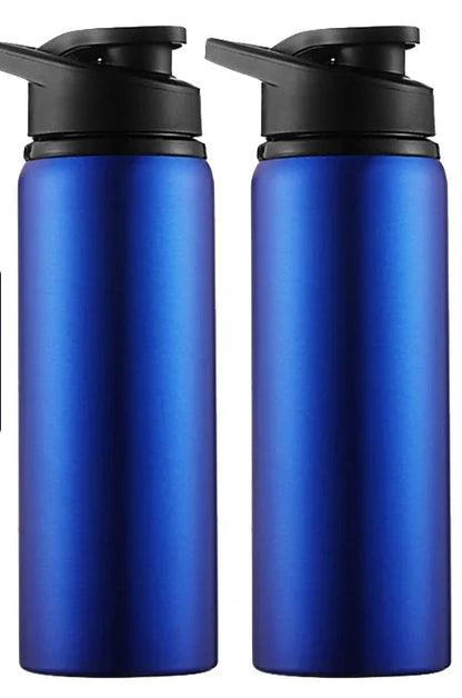 Two Ten Essentials blue stainless steel water bottles with black lids are side by side. The left one has a BLUE 2PCS label in white on light blue. Perfect for outdoor sports, these portable, reusable 700ml flasks offer durability and style on the go.