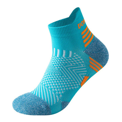 Introducing Ten Essentials Professional Marathon Running Socks – cushioned, low-cut sports ankle socks with blue and orange geometric zigzags and stripes. Featuring moisture-wicking technology and reinforced toe/heel for comfort/support, their vibrant design enhances the sporty look.