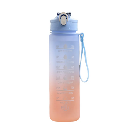 The Ten Essentials Sports Water Bottle holds 750-800ML and features white motivational time markers from 8am to 1pm, a gradient of light blue to peach, a flip-top lid, blue strap, and integrated time-tracking straw.