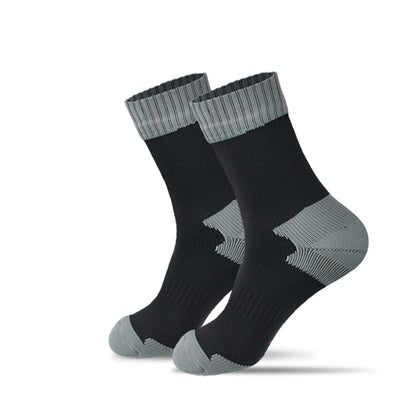 The Ten Essentials Waterproof Outdoor Sports Socks in black feature gray cuffs, heels, and toes. Set against a white background, their ribbed texture and contrasting colors stand out, making them ideal for warm, breathable hiking and skiing adventures.