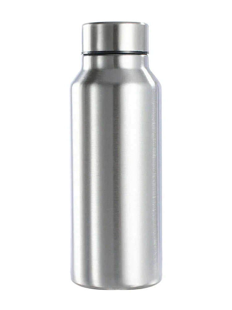 The Ten Essentials 1000ml Stainless Steel Sports Water Bottle features a sleek silver finish, a tight screw-on cap, and a smooth cylindrical design. This durable, eco-friendly flask keeps beverages hot or cold with its generous capacity.