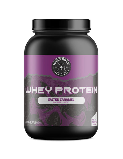 A Hard Rock Health container of Whey Protein in salted caramel flavor features a purple label with mountains, BCAAs, and weighs 907g or 2 lbs.